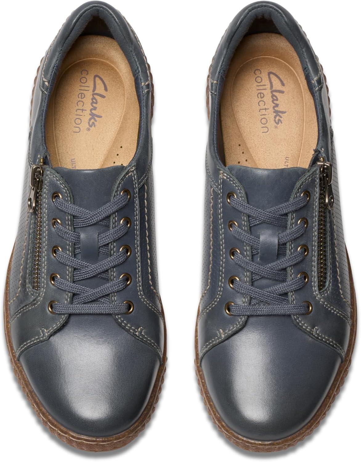 imageClarks Womens Caroline Janna Leather Side Zip Fashion SneakerDark Blue