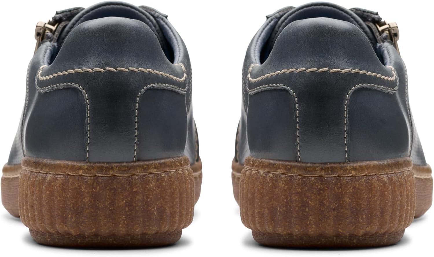 imageClarks Womens Caroline Janna Leather Side Zip Fashion SneakerDark Blue