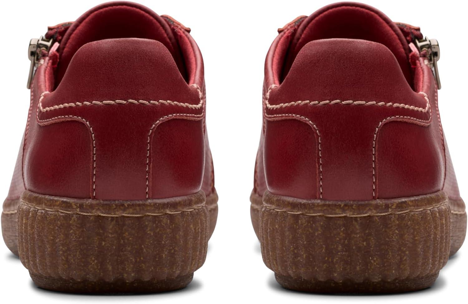 imageClarks Womens Caroline Janna Leather Side Zip Fashion SneakerRed Leather