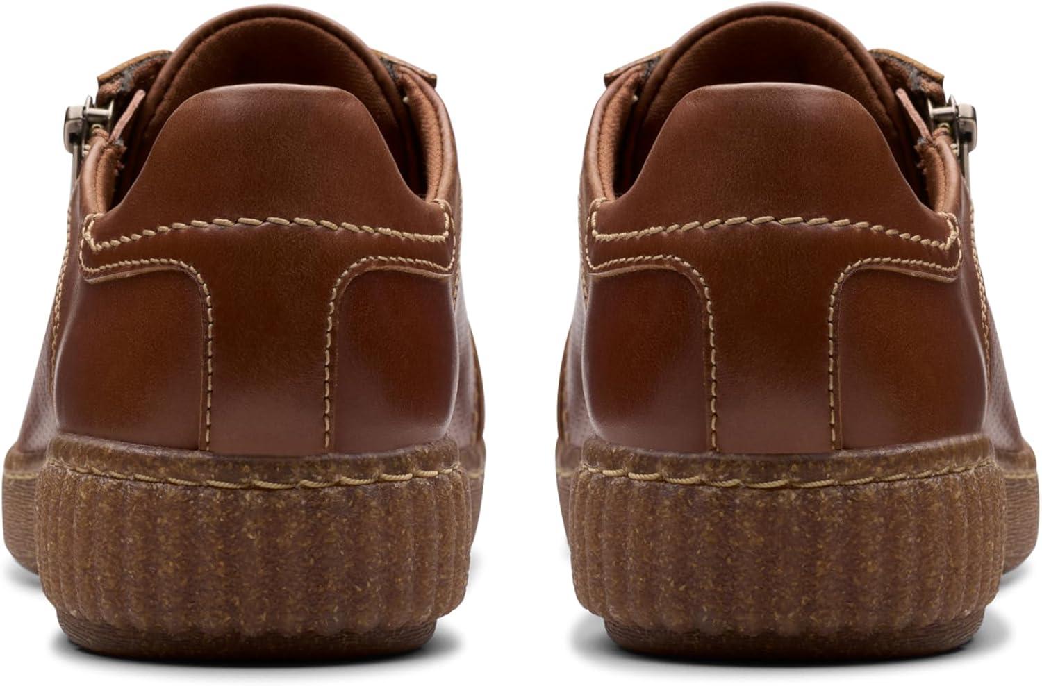 imageClarks Womens Caroline Janna Leather Side Zip Fashion SneakerTan Leather