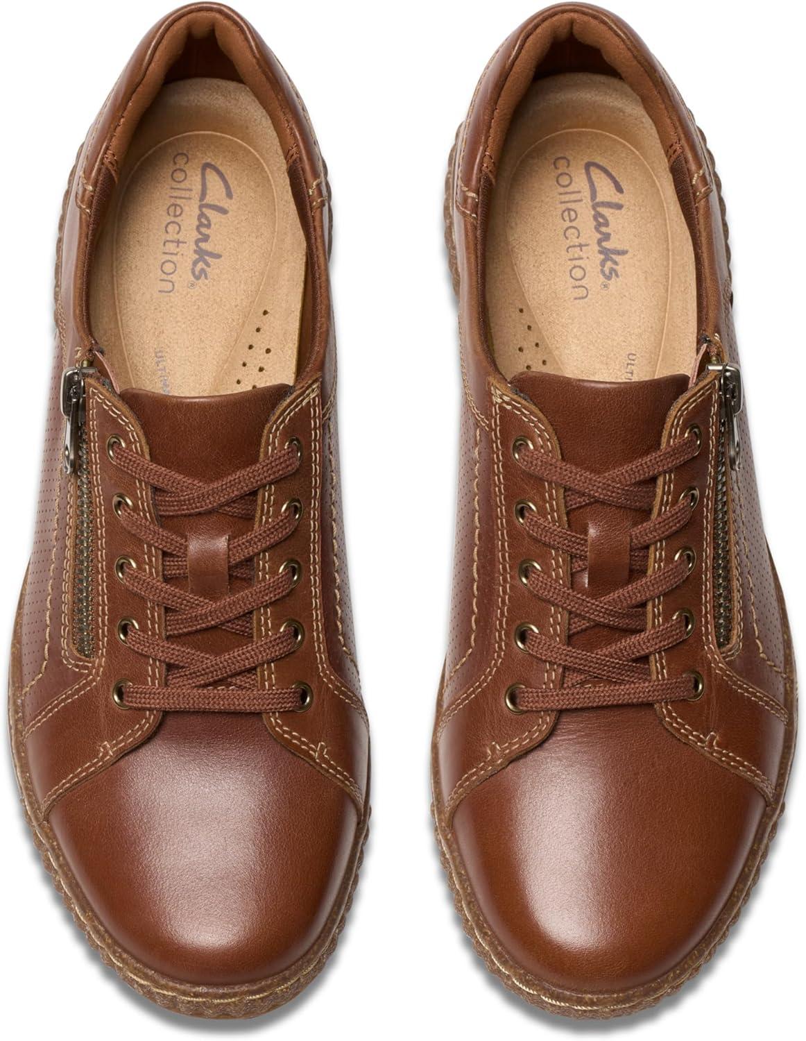 imageClarks Womens Caroline Janna Leather Side Zip Fashion SneakerTan Leather